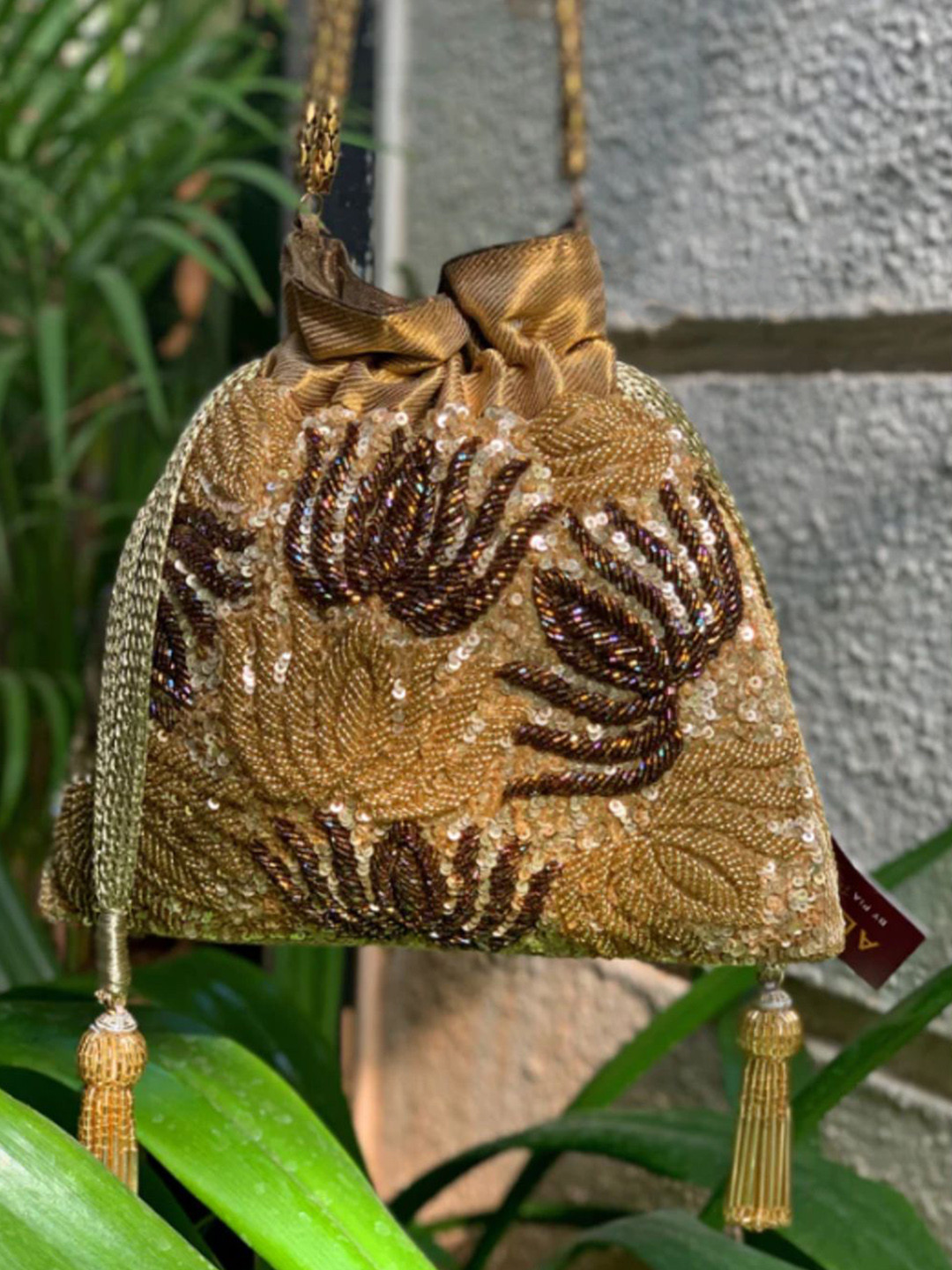 

Aloha by PS Textured Oversized Structured Handheld Bag with Tasselled, Gold