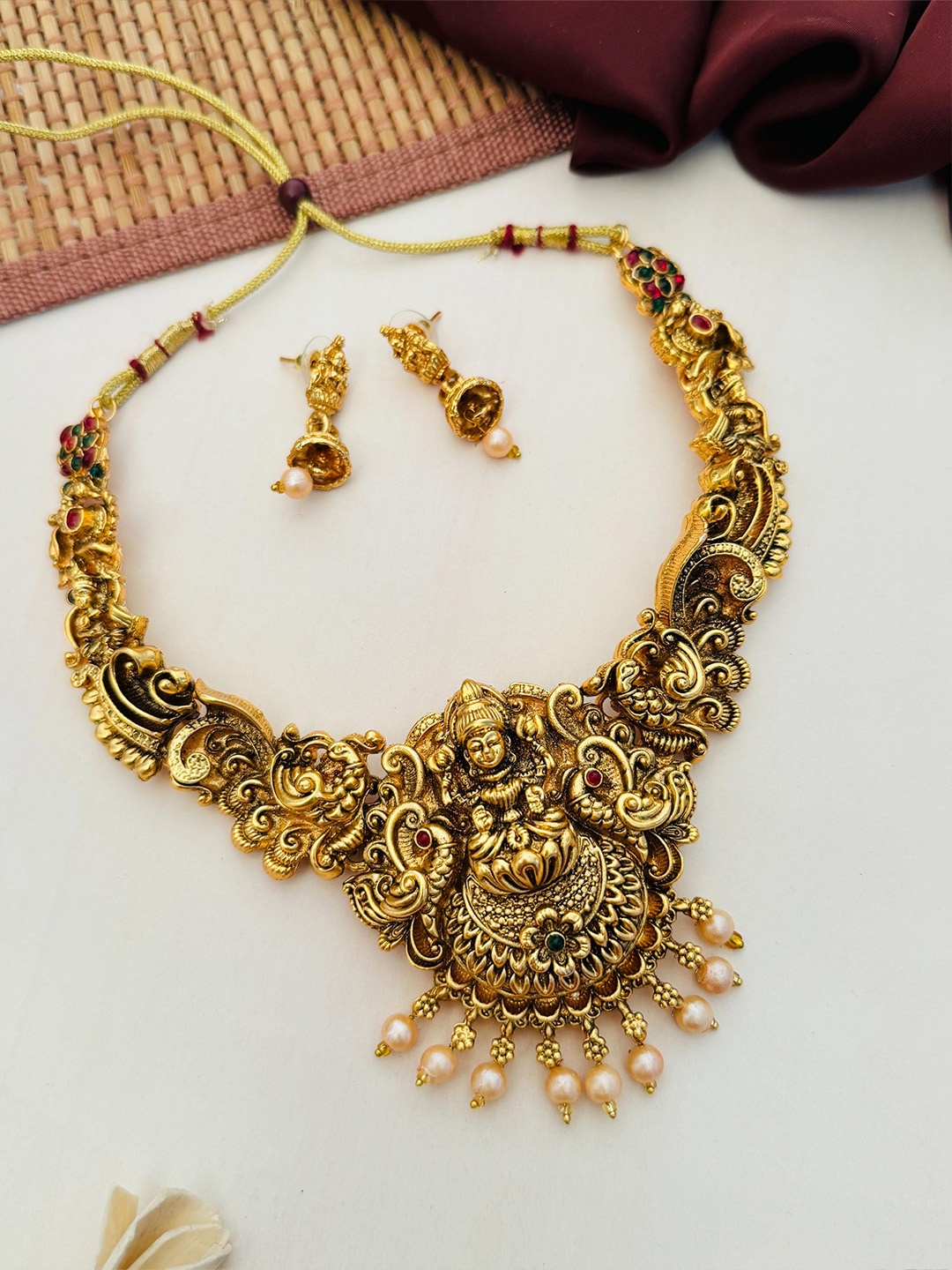 

ABDESIGNS Sophisticated Gold Plated AD Stone Studded & Beaded Lakshmi God Jewellery Set