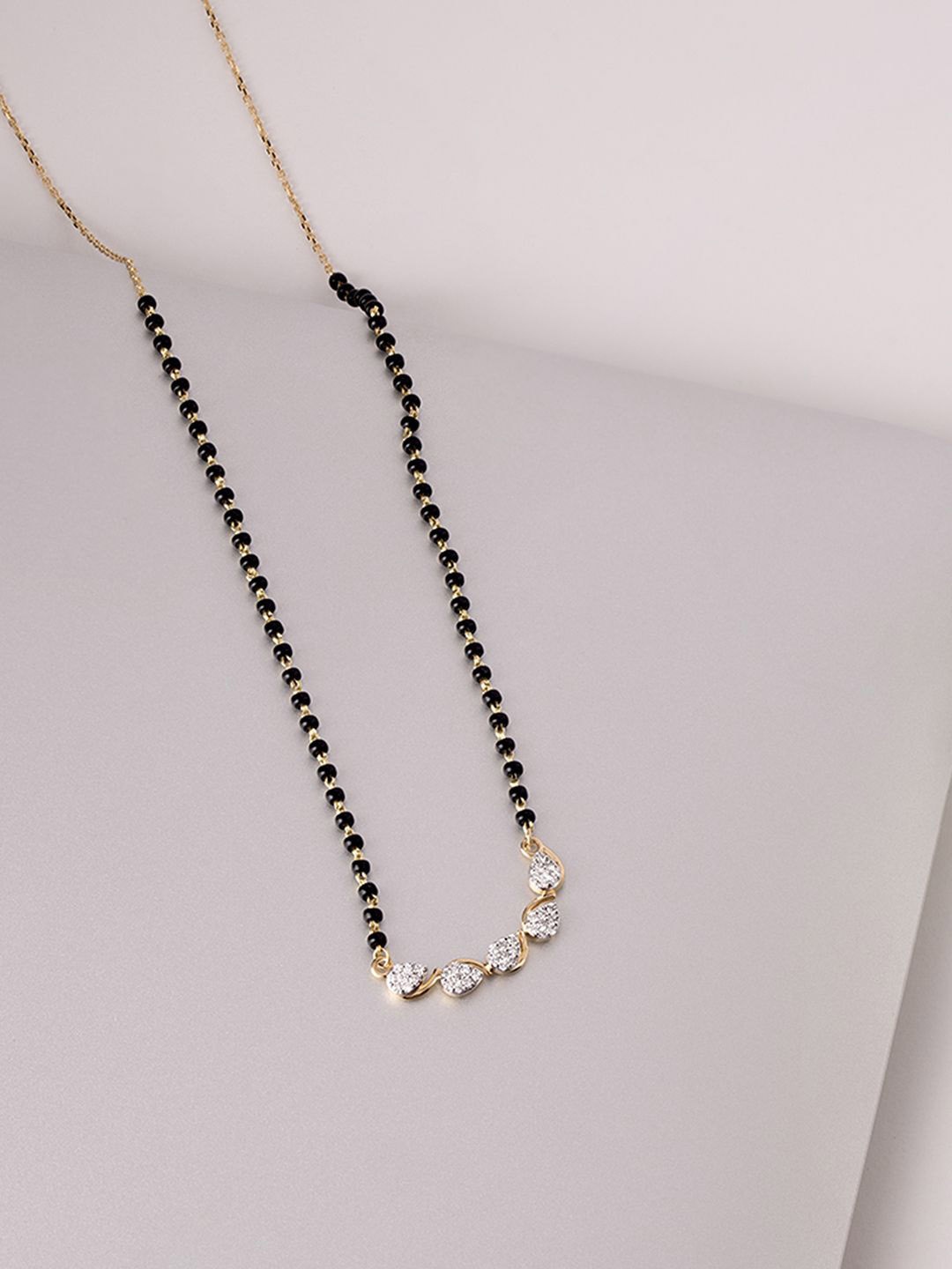 

Mia by Tanishq 18KT Gold & Stone Studded Mangalsutra