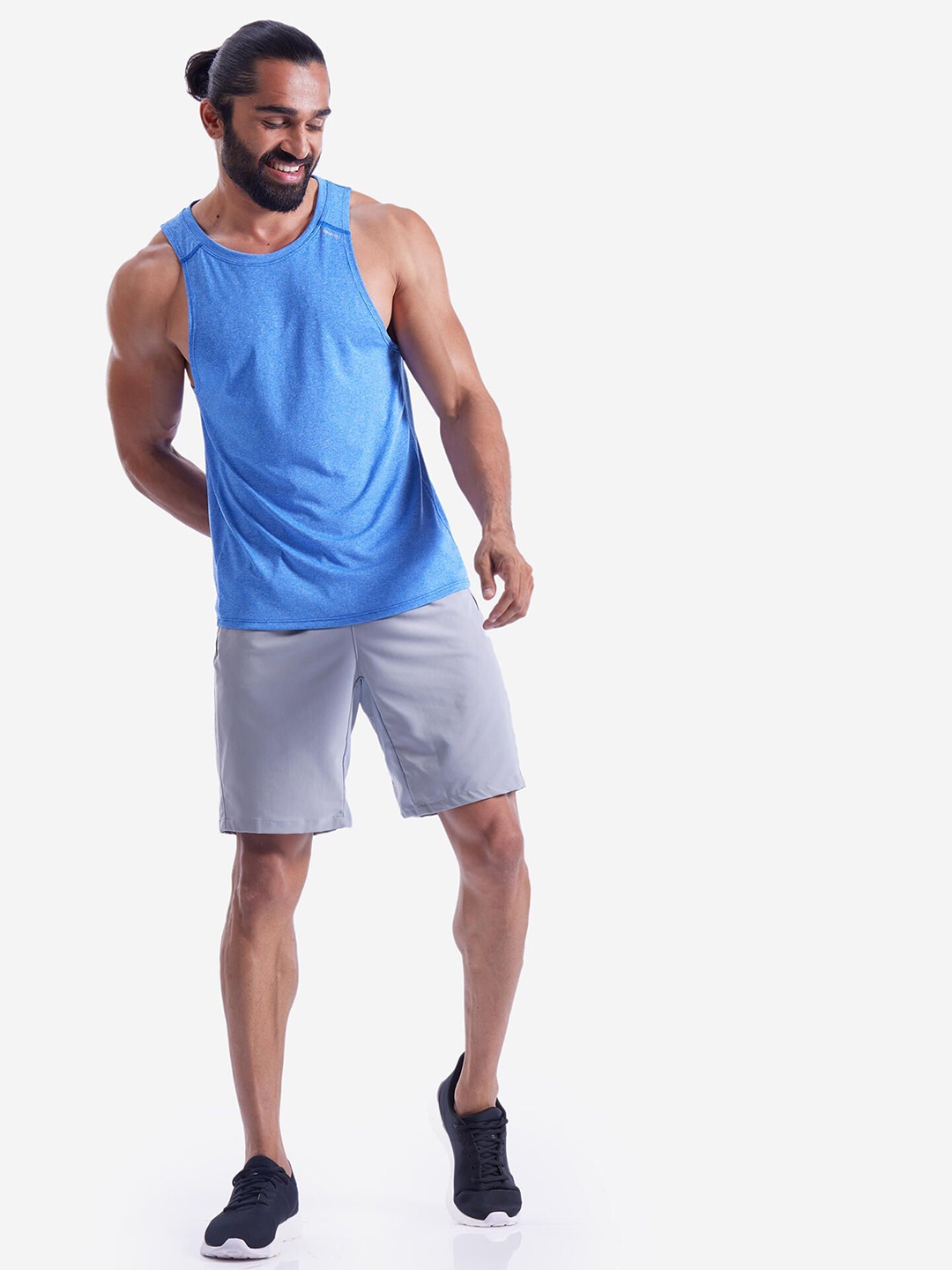 

Domyos By Decathlon Men Solid Gym Tank T-shirt, Blue