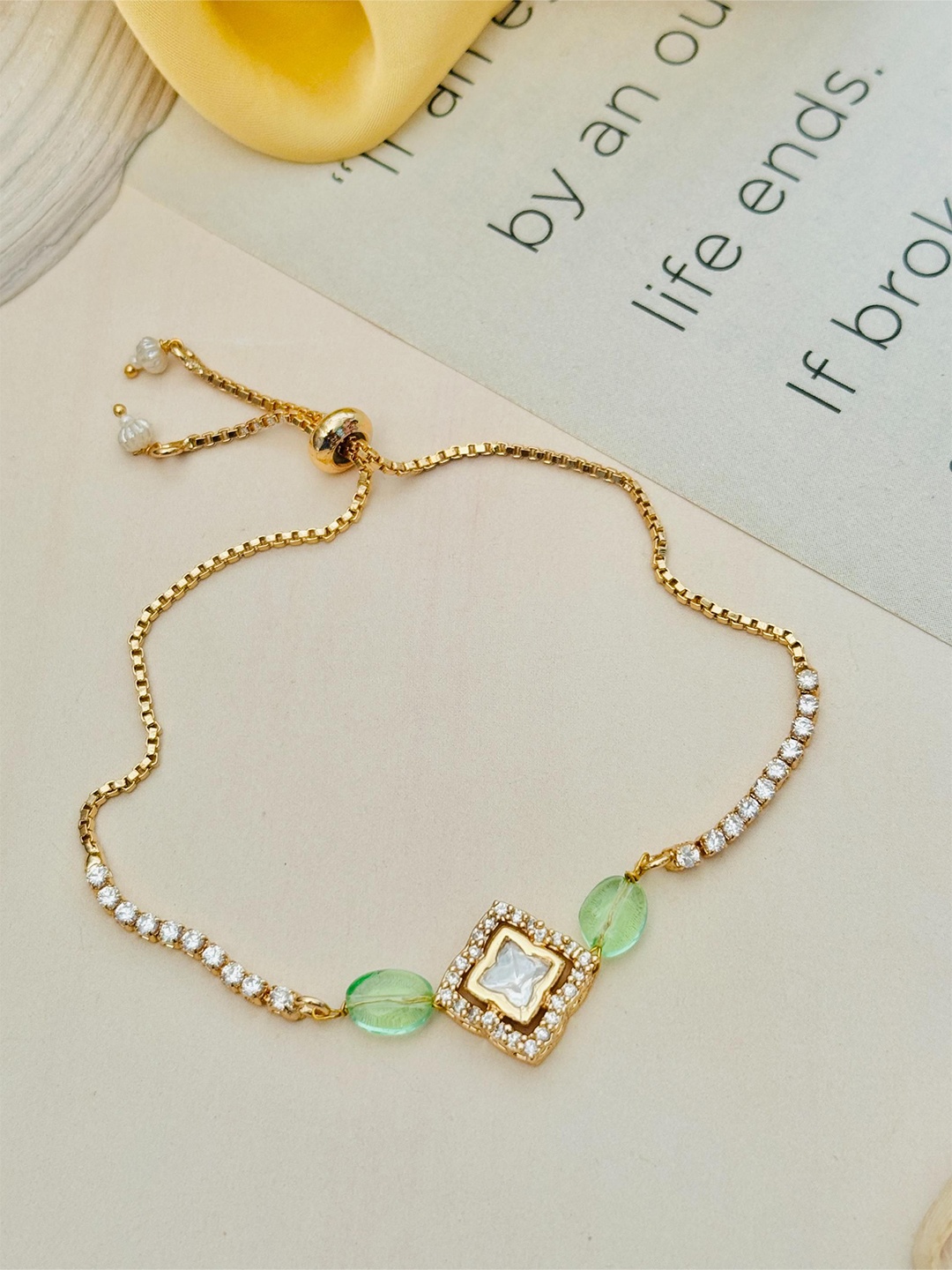 

ABDESIGNS Brass American Diamond Gold-Plated Charm Bracelet