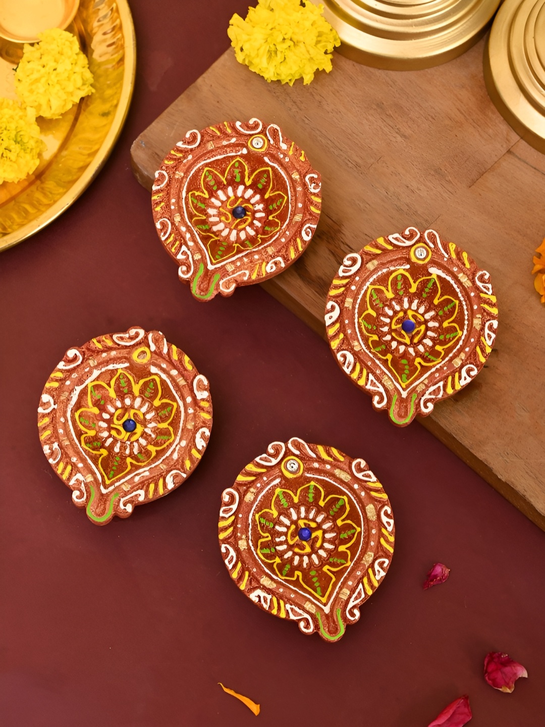 

Aapno Rajasthan Rust & Yellow 4 Pieces Floral Printed Terracotta Diyas