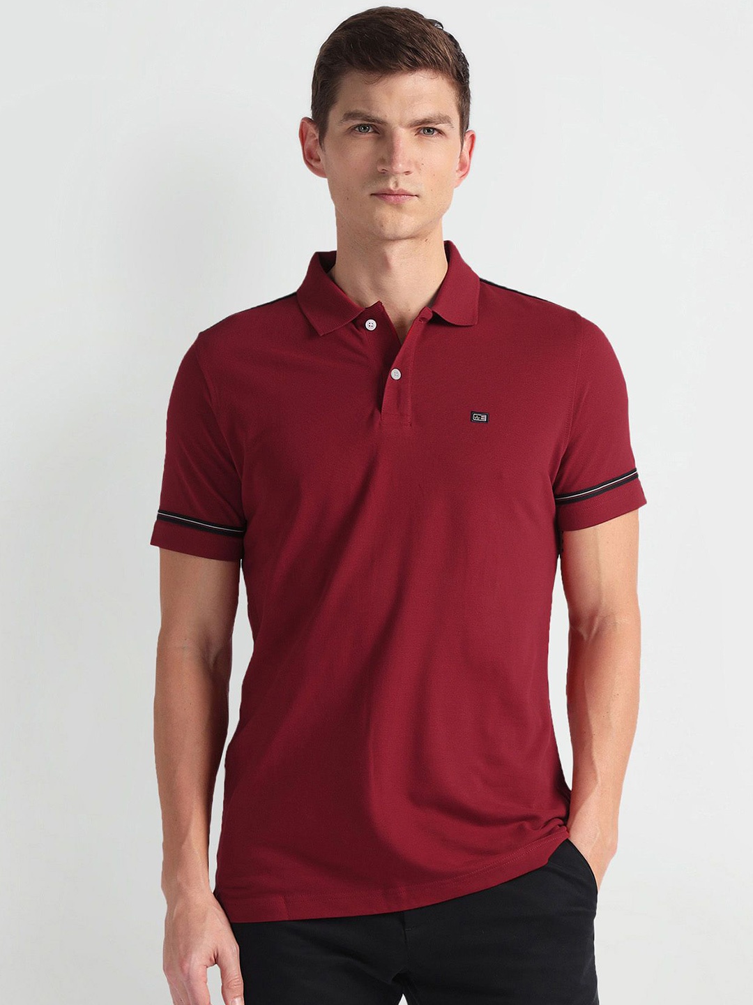 

Arrow Sport Men Solid Polo Collar T-shirt, Red