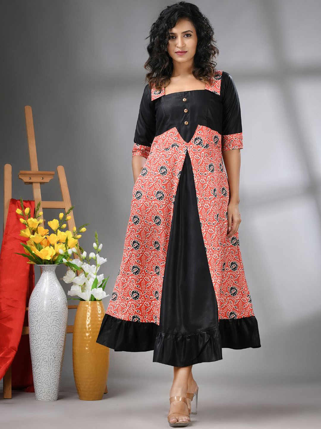 

Charukriti Women Ajrat Printed A-Line Maxi Ethnic Dresses, Orange