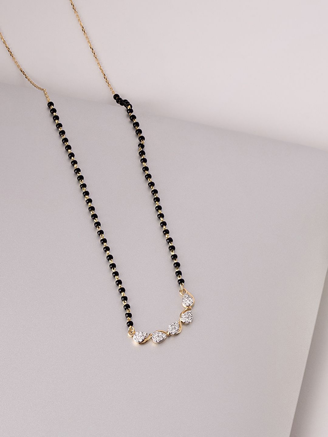 

Mia by Tanishq 18 KT Raindrop Radiance Gold & Diamond Mangalsutra, Yellow