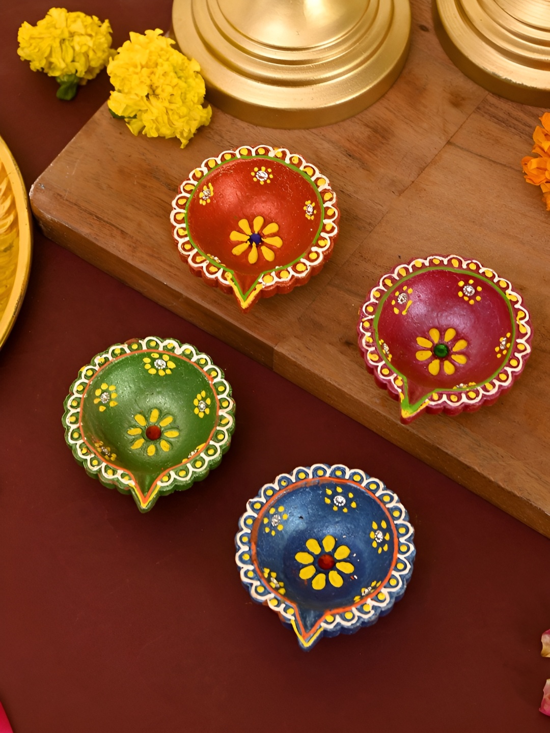 

Aura Blue & Green 4 Pieces Floral Printed Terracotta Diyas