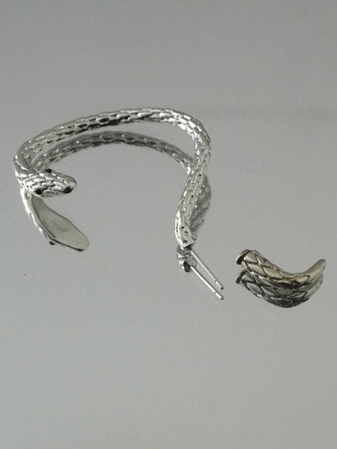 

Krelin Silver-Plated Animal Shaped Stainless Steel Antique Ear Cuff Earrings