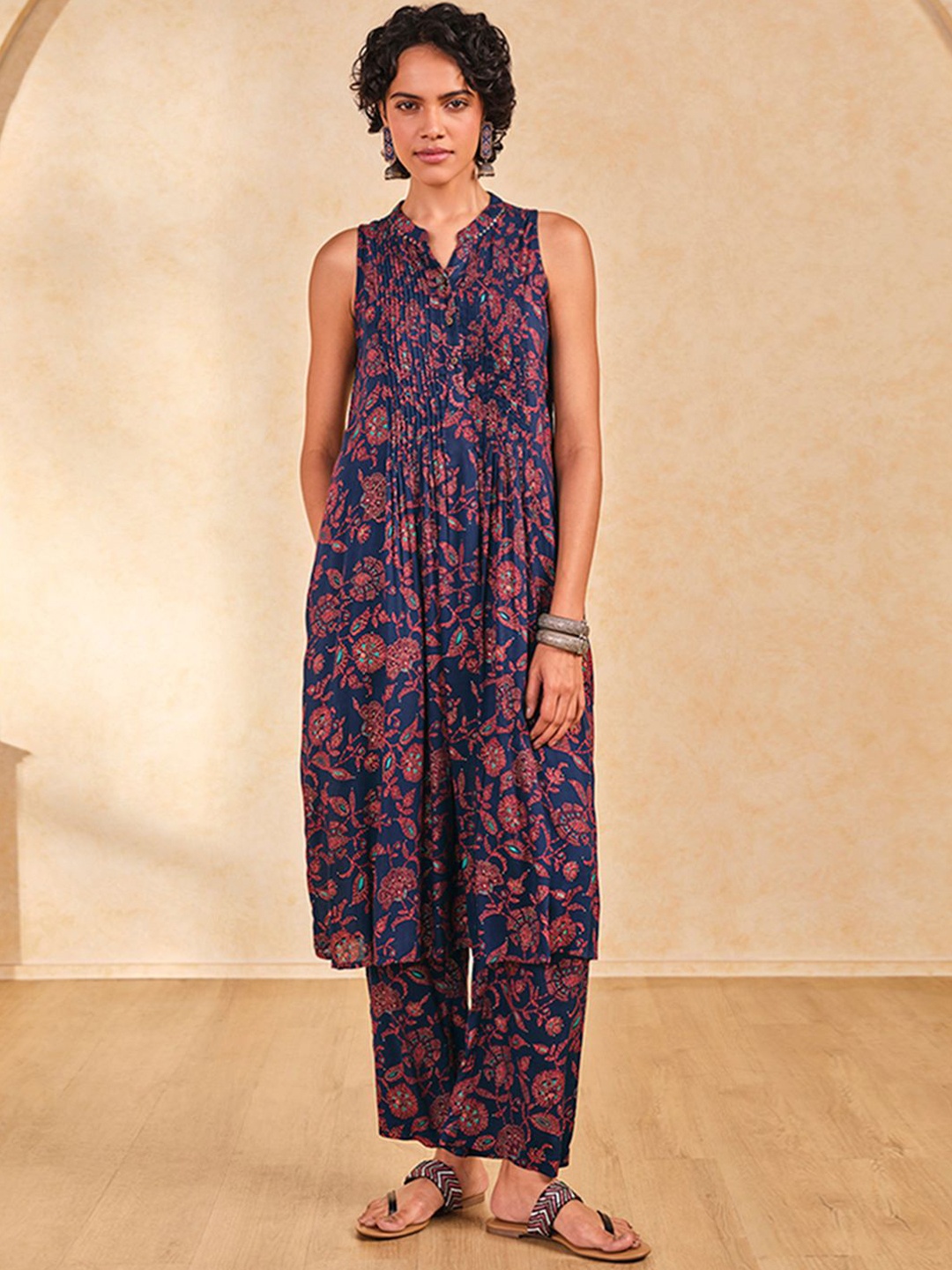 

Global Desi Floral Printed Sequinned Mandarin Collar Sleeveless A-Line Kurta With Palazzo, Navy blue