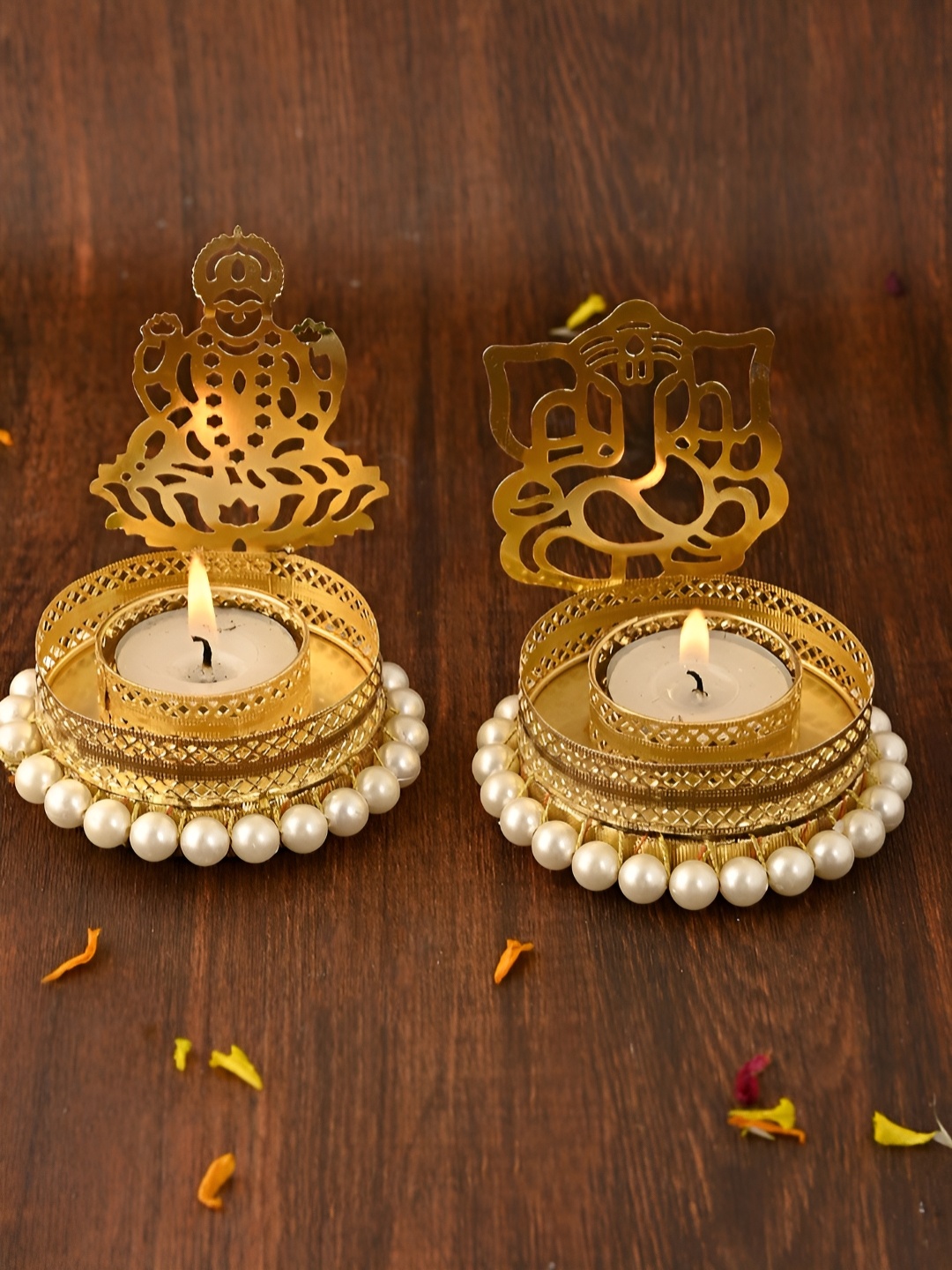 

Aapno Rajasthan White & Gold-Toned 2 Pieces Laxmi Ganesh Metal Candle Holders