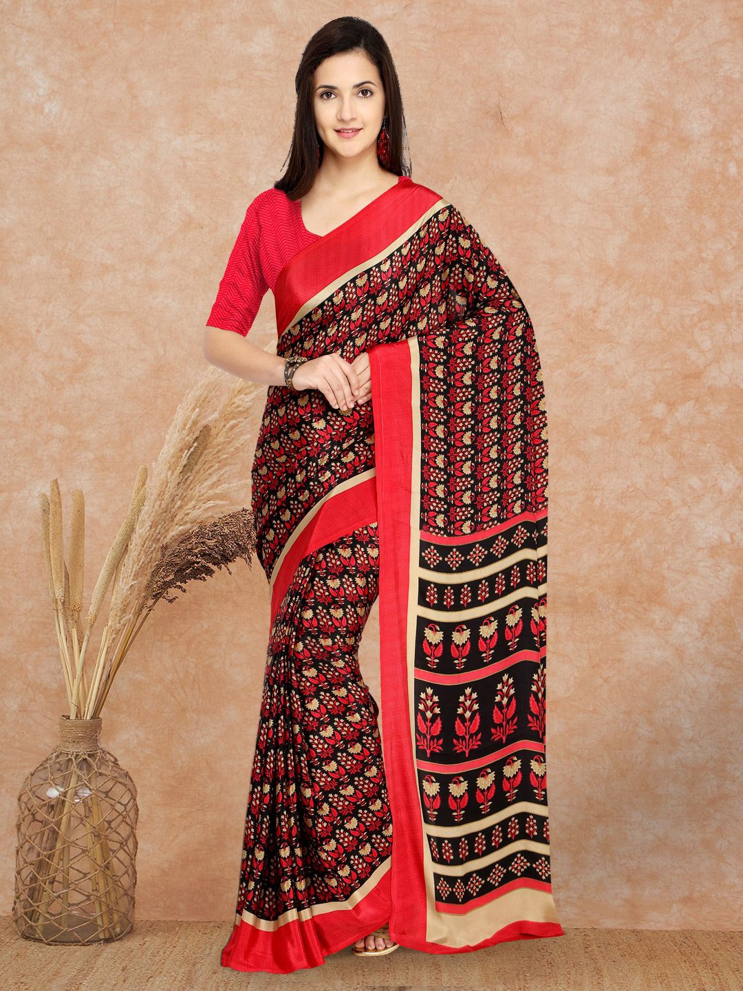 

Sangria Women Printed Sarees, Red