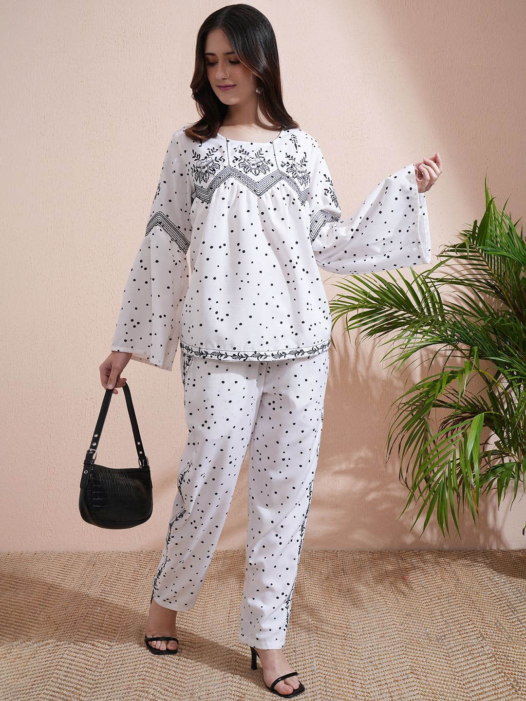 

Vishudh White Embroidered Round Neck Long Sleeves Top With Trouser