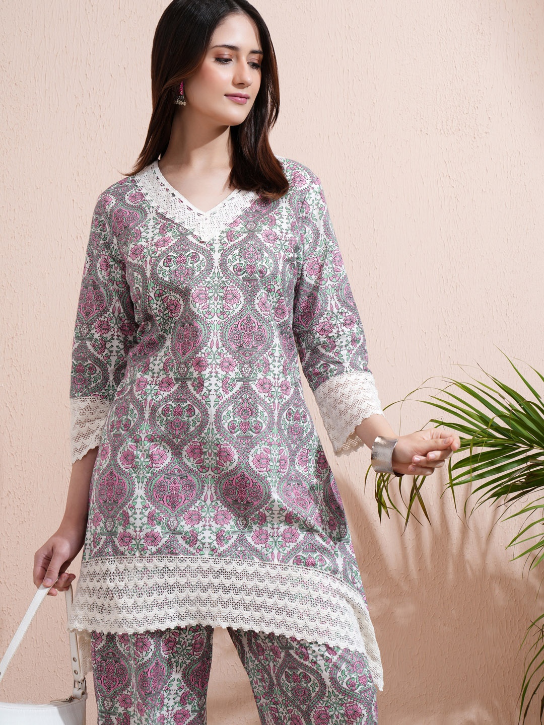 

Vishudh Cream Printed V-Neck Three-Quarter Sleeves Pure Cotton Top With Trouser