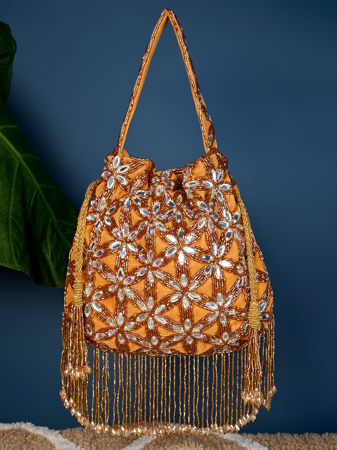 

A Clutch Story Embellished Bucket Handheld Bag with Tasselled, Orange
