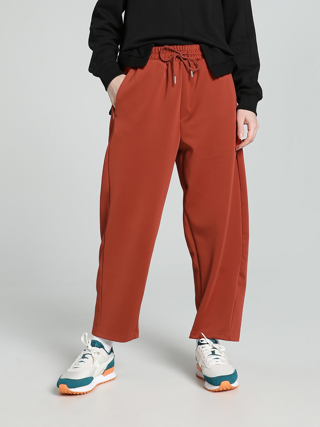 

Puma CLASSICS Women Logo Printed Relaxed Fit Track Pants, Red