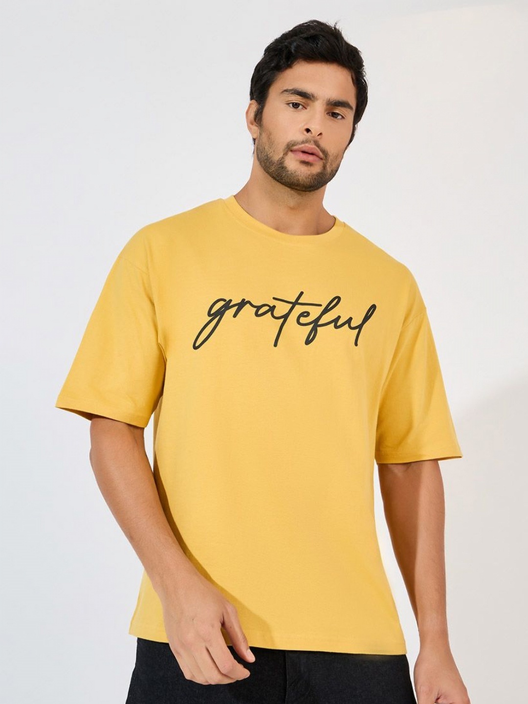 

Styli Men Typography Printed Oversized Tshirt, Yellow