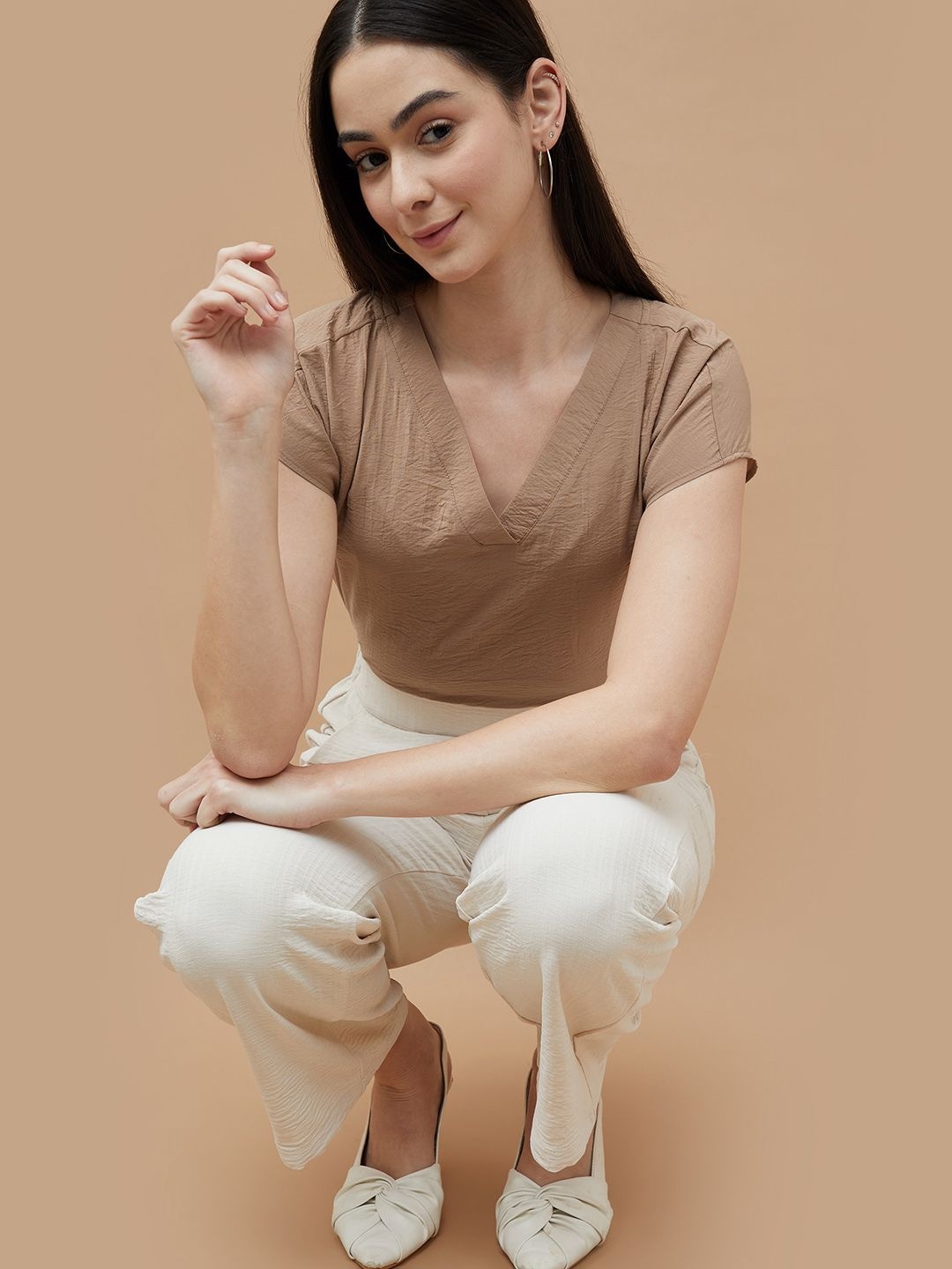 

Fame Forever by Lifestyle Women Solid V-Neck Top, Beige
