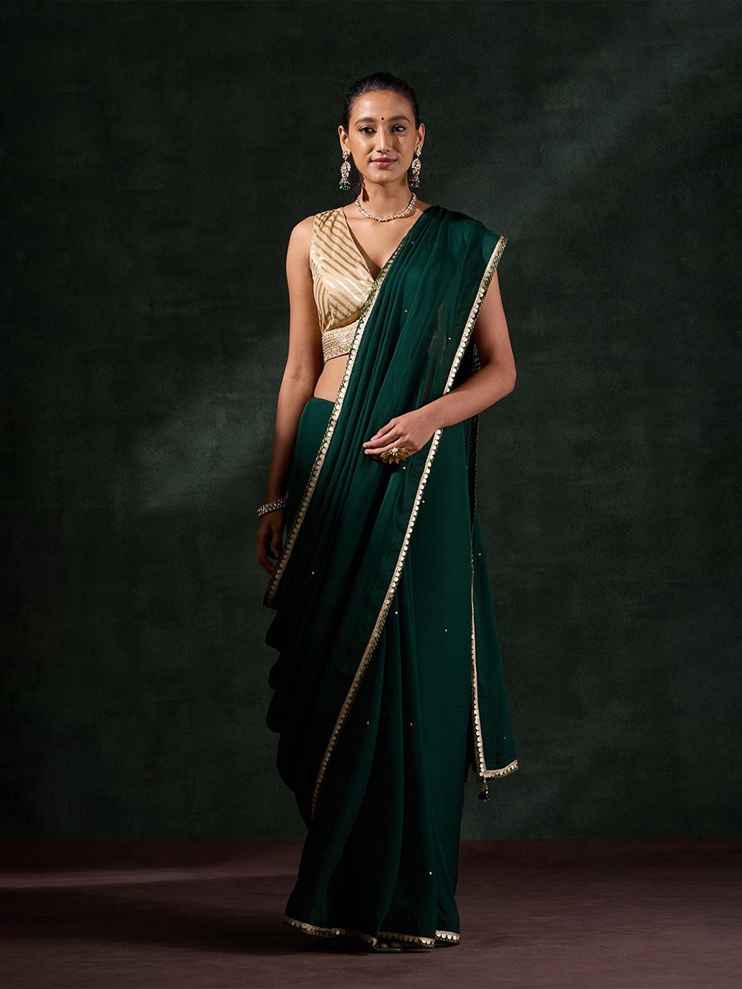

Taneira Solid Embroidered Saree, Green