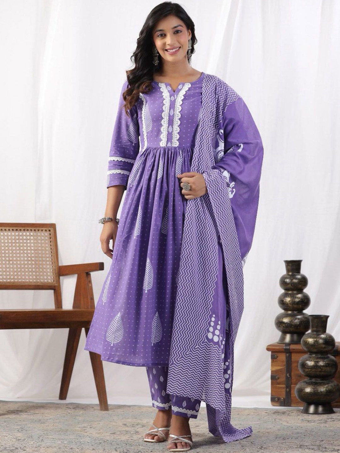 

Meena Bazaar Floral Printed Pleated Thread Work Kurta with Trousers & Dupatta, Purple