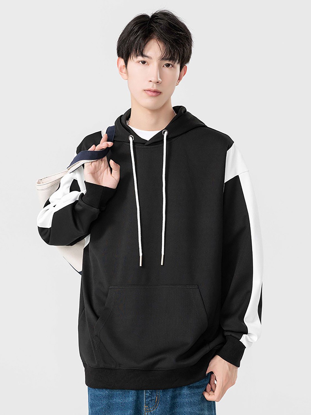 

StyleCast x Revolte Men Colourblocked Hooded Sweatshirt, Black