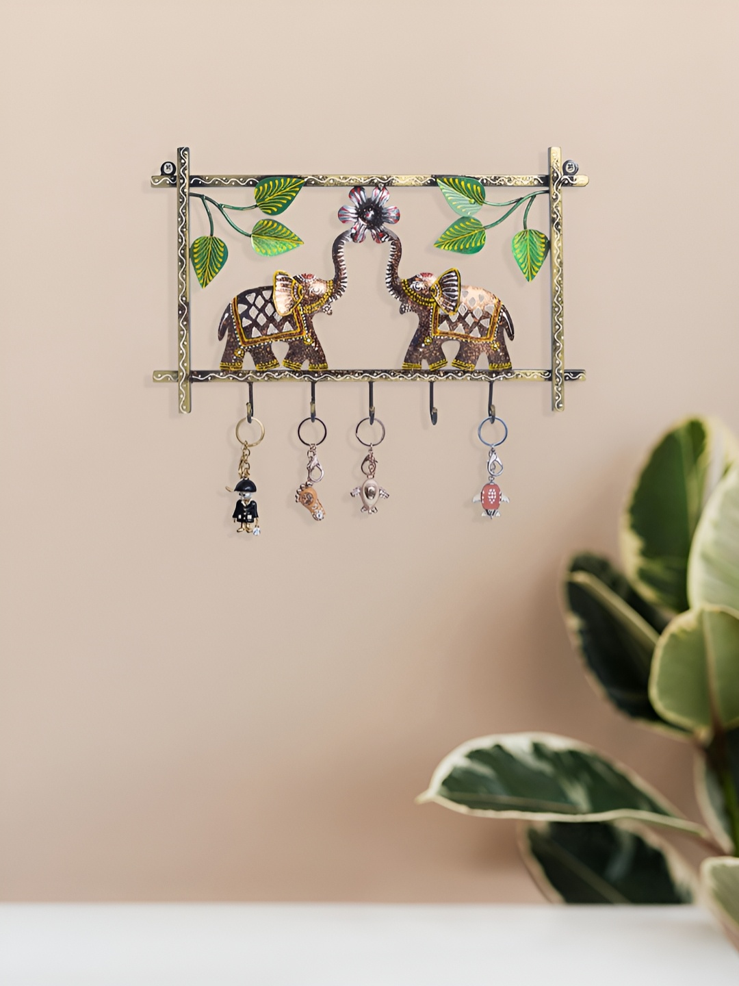 

Golden Peacock Brown & Green Textured 5 Knobs Key Holders