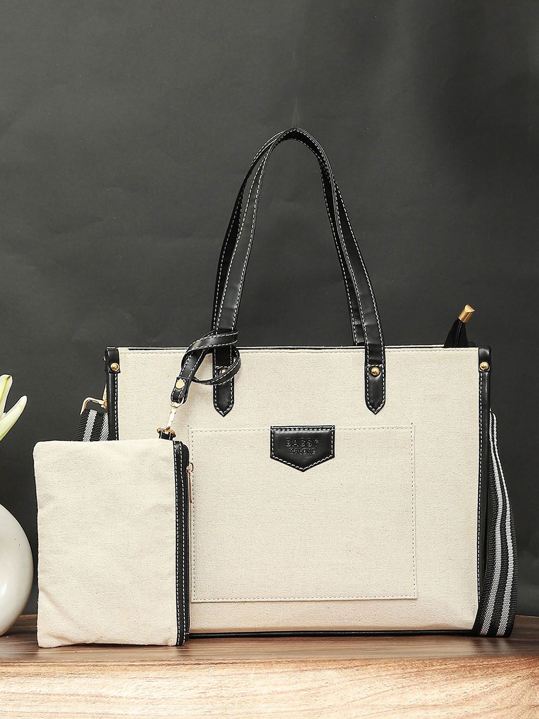 

Bagsy Malone Women Solid Structured Shoulder Up To 16 Inch Bag, White