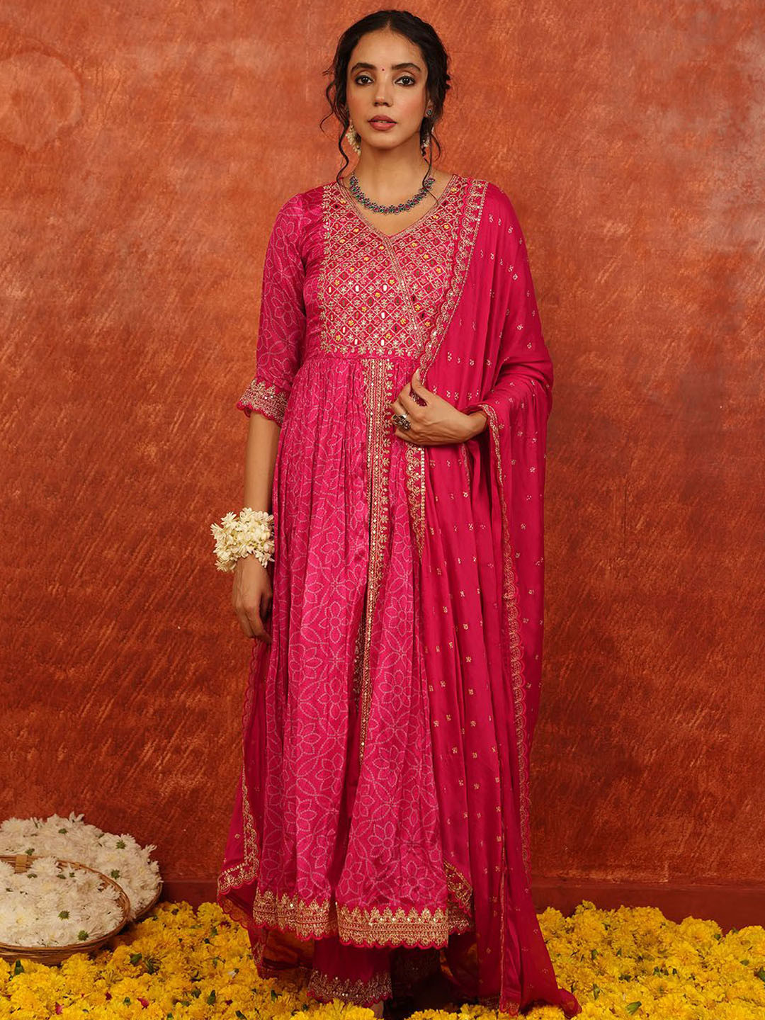 

Meena Bazaar Bandhani Printed Pleated Thread Work Kurta with Trousers & Dupatta, Pink