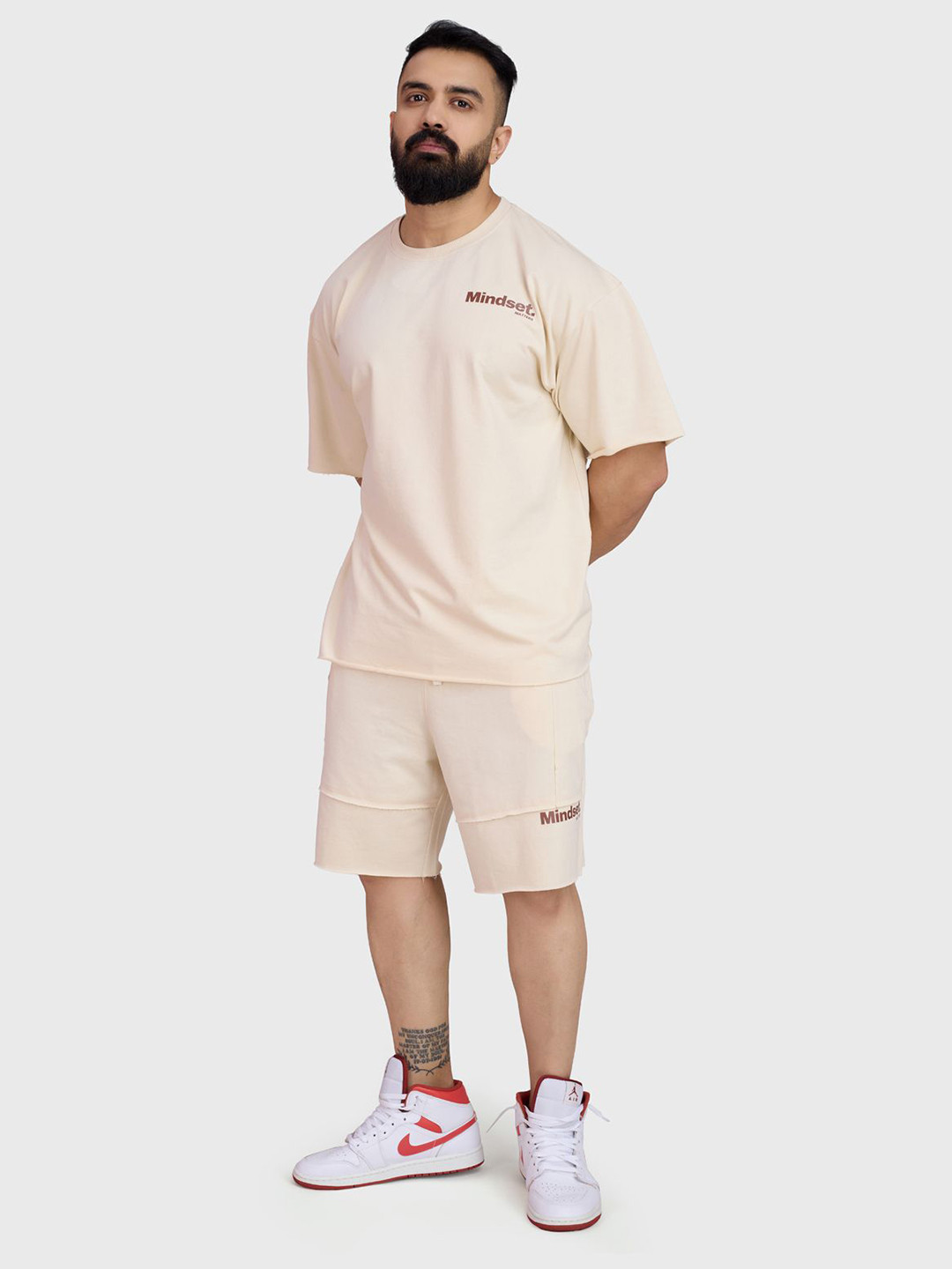 

FUAARK Men Abzorb Typography Printed Round Neck Cotton Oversized T-shirt, Beige