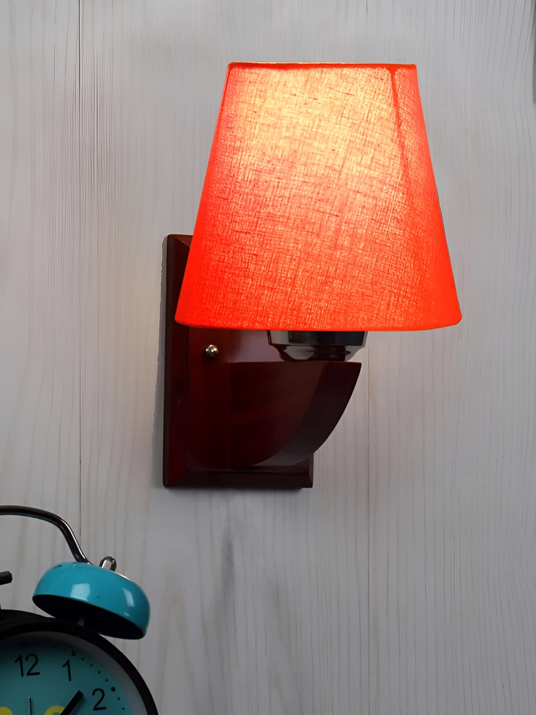 

Devansh Orange-Coloured & Brown Frustum Shaped Contemporary Wooden Wall Lamp