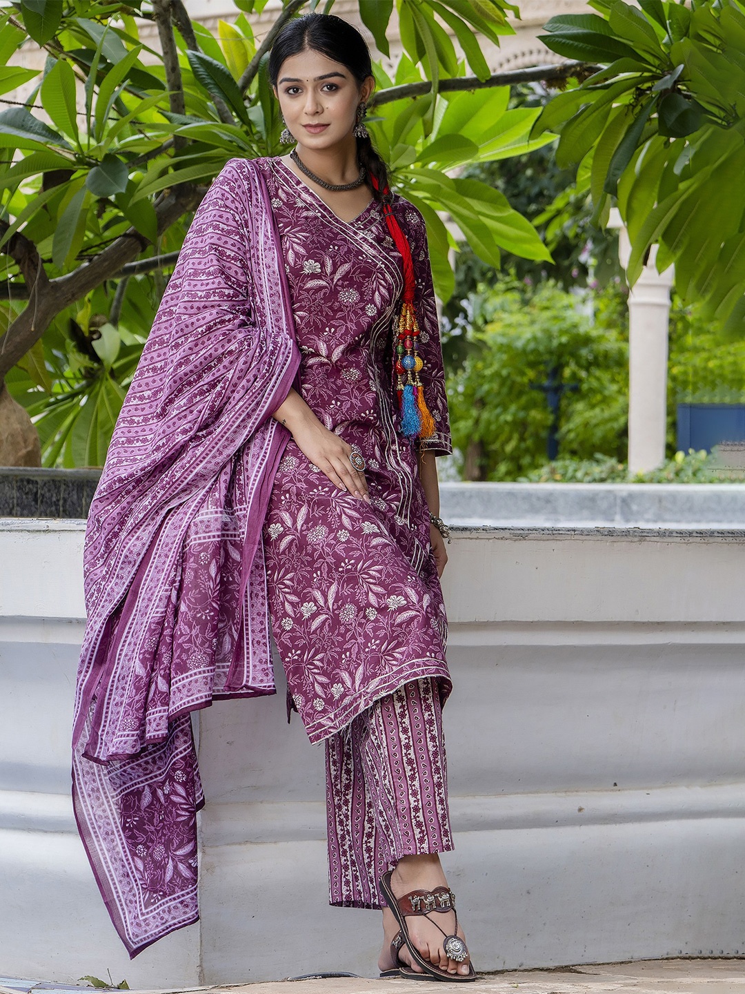 

PARTHVI Floral Printed V-Neck Straight Kurta With Trousers & Dupatta, Purple