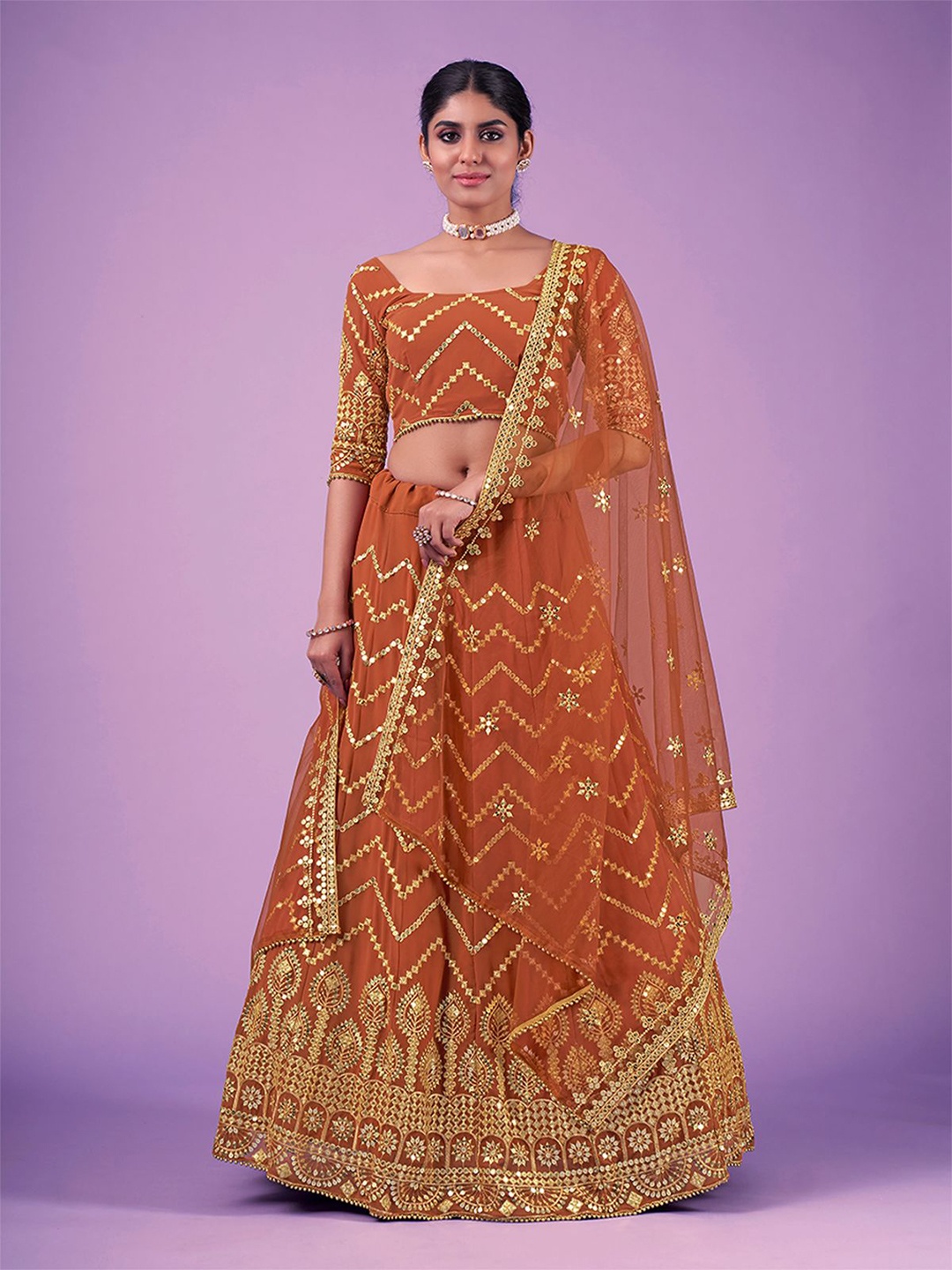 

ODETTE Floral Embroidered Sequinned Net Semi-Stitched Lehenga & Blouse With Dupatta, Rust