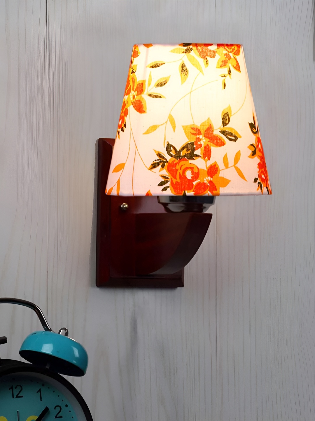 

Devansh White & Orange Printed Wood Traditional Frustum Shaped Wall Lamp
