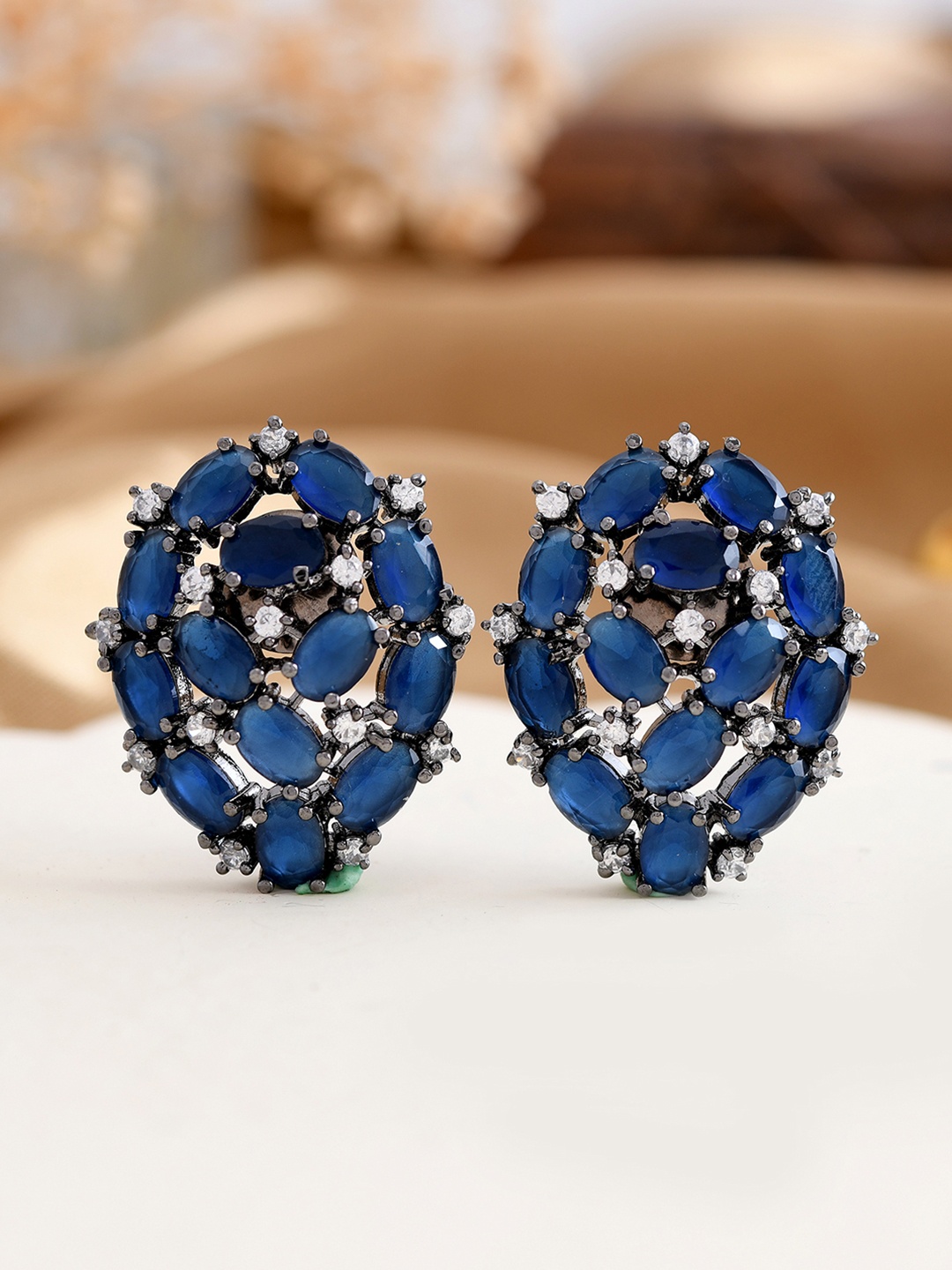 

Shoshaa Copper-Plated Oval American Diamond Studs, Blue