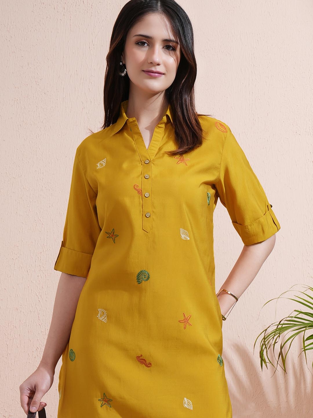 

Vishudh Mustard Embroidered Shirt Collar Three-Quarter Sleeves Top With Trouser