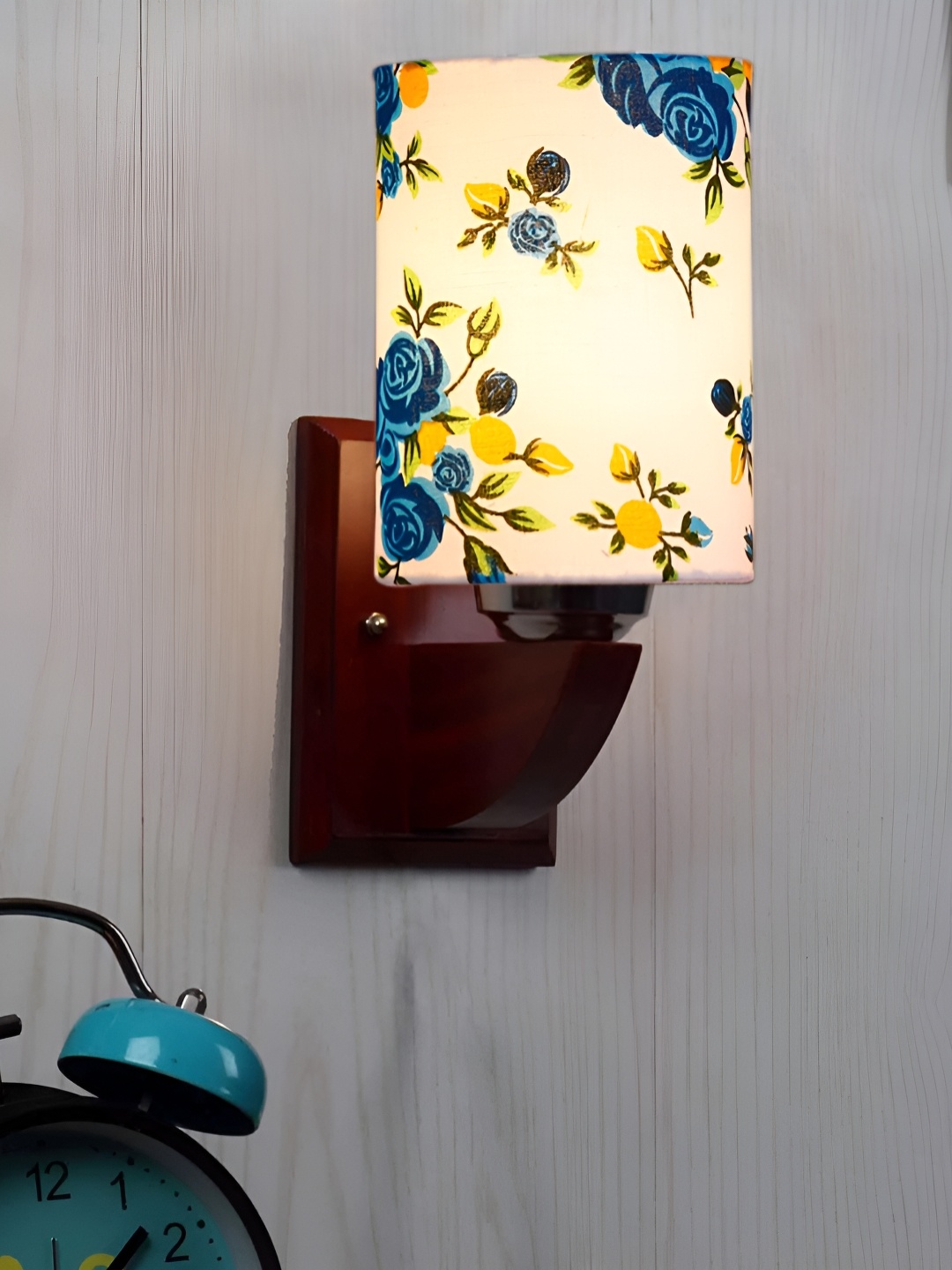 

Devansh White & Blue Printed Wood Traditional Cylinder Shaped Wall Lamp