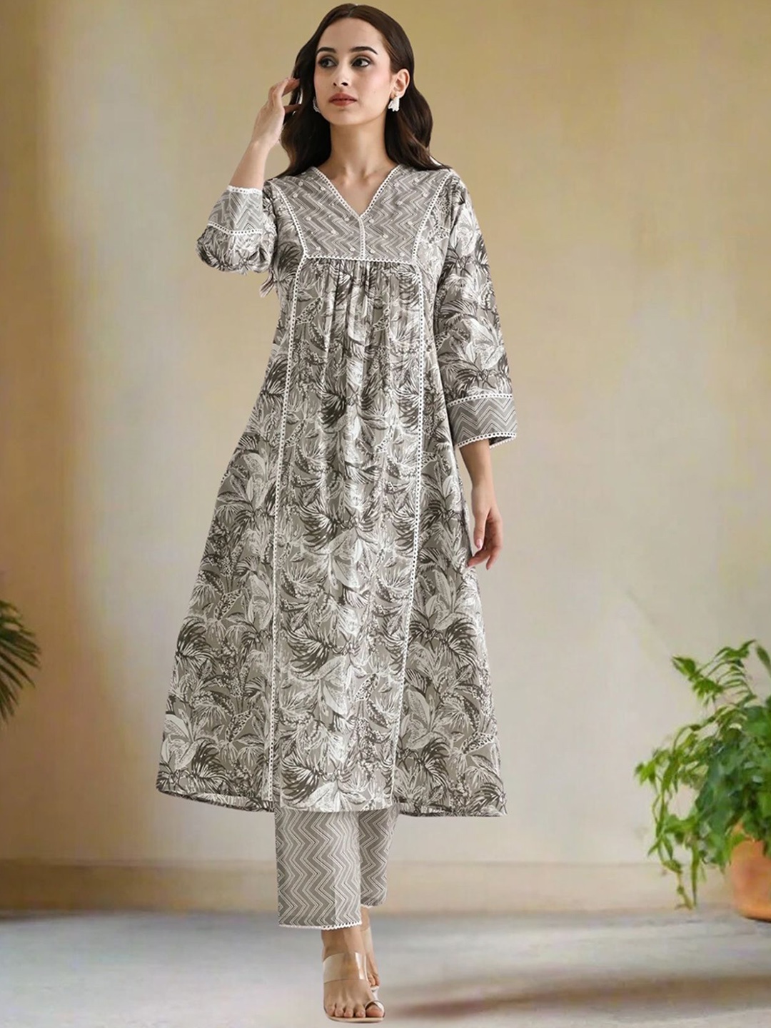 

KALINI Floral Yoke Design Pleated Beads and Stones Kurta with Trouser, Grey