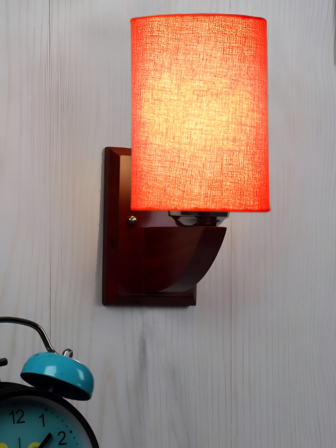 

Devansh Orange-Coloured & Brown Cylinder Shaped Contemporary Wooden Wall Lamp