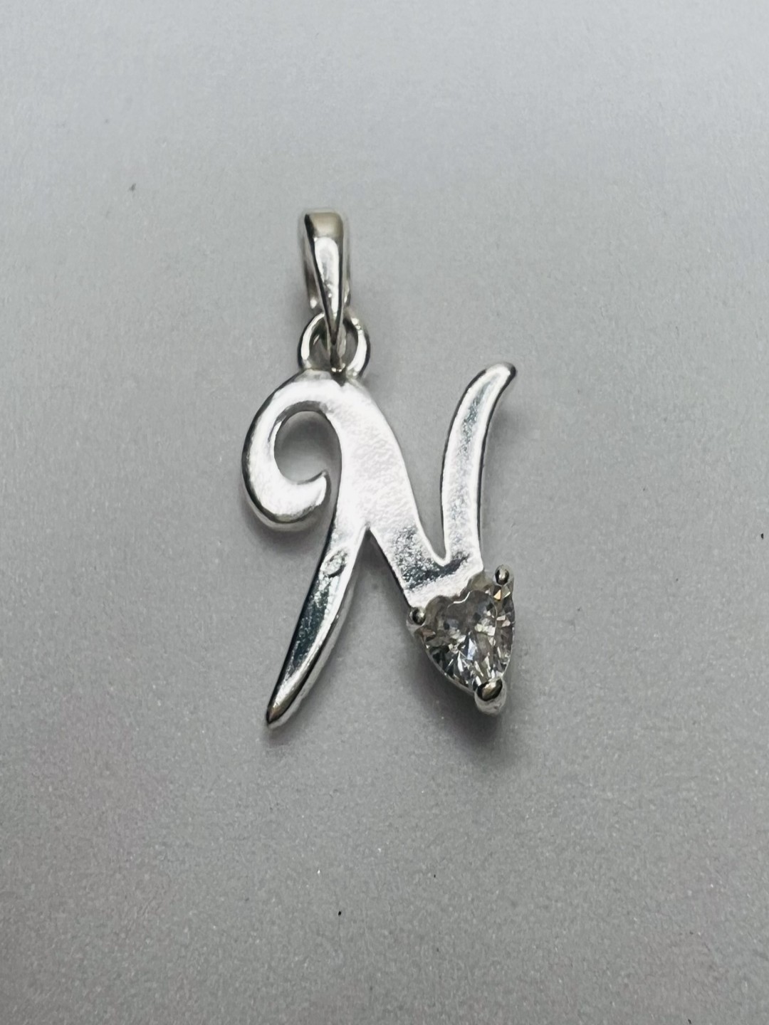 

Arte Jewels Cubic Zirconia Studded Contemporary Pendant, Silver