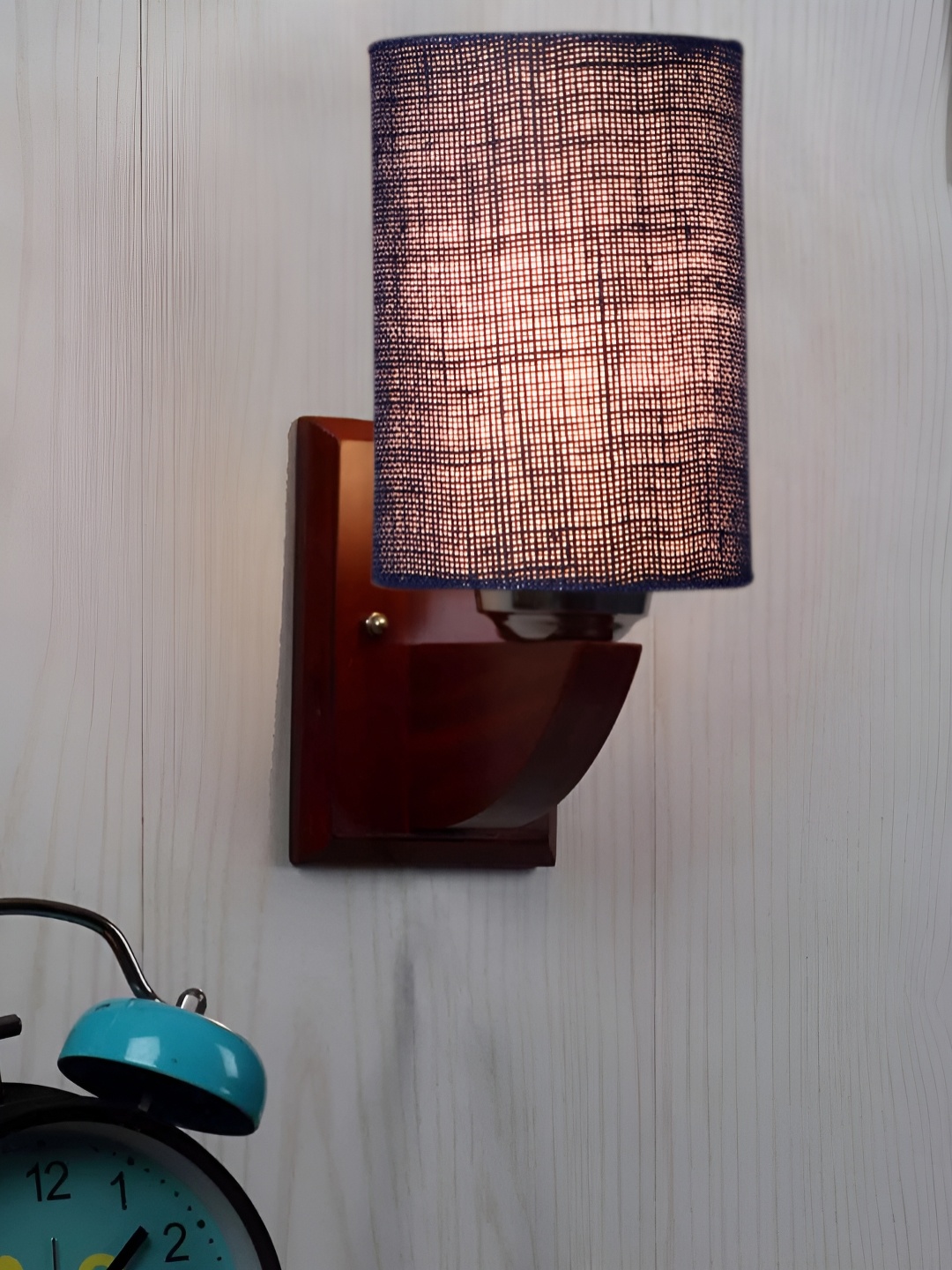 

Devansh Blue Wood Traditional Abstract Shaped Shaped Wall Lamp