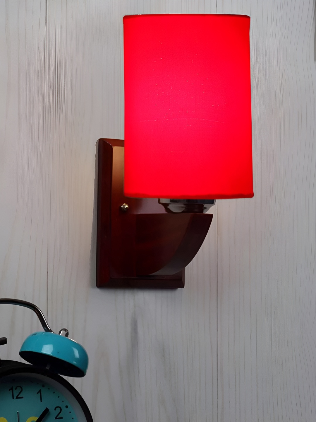 

Devansh Red & Brown Cylinder Shaped Contemporary Wooden Wall Lamp