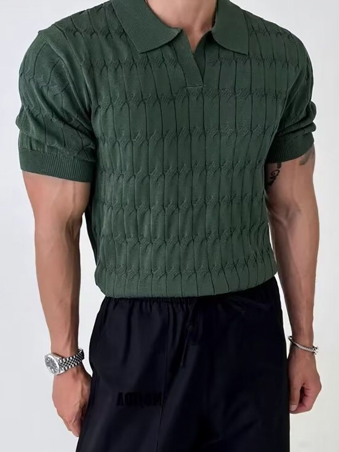 

StyleCast x Revolte Men Self Design Polo Collar T-shirt, Green