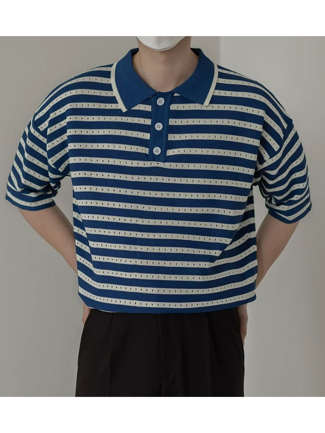 

StyleCast x Revolte Men Self Design Polo Collar T-shirt, Blue