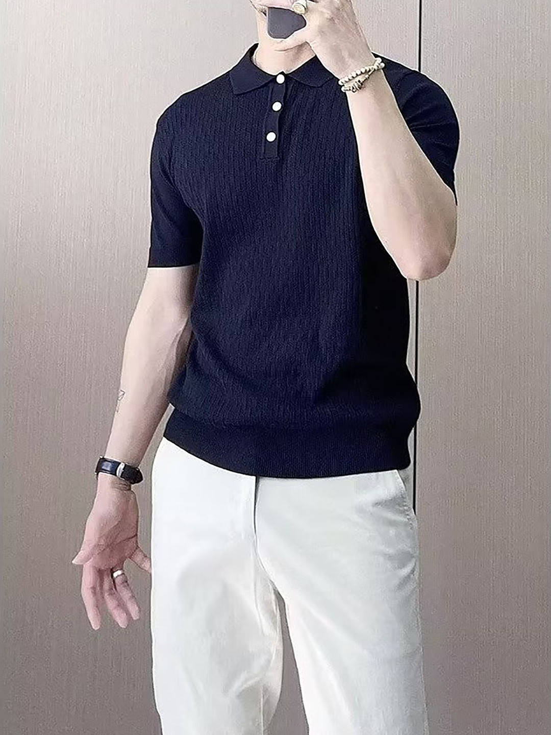 

StyleCast x Revolte Men Self Design Polo Collar T-shirt, Black