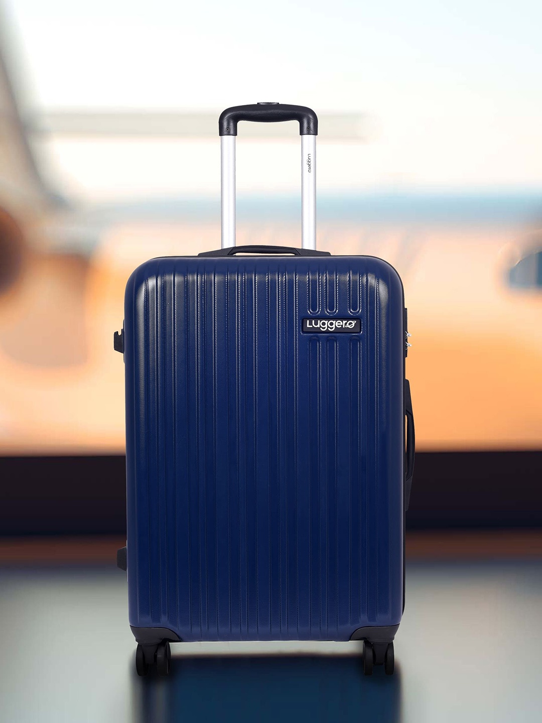 

Luggero Textured Hard-Sided Medium Trolley Bags, Blue