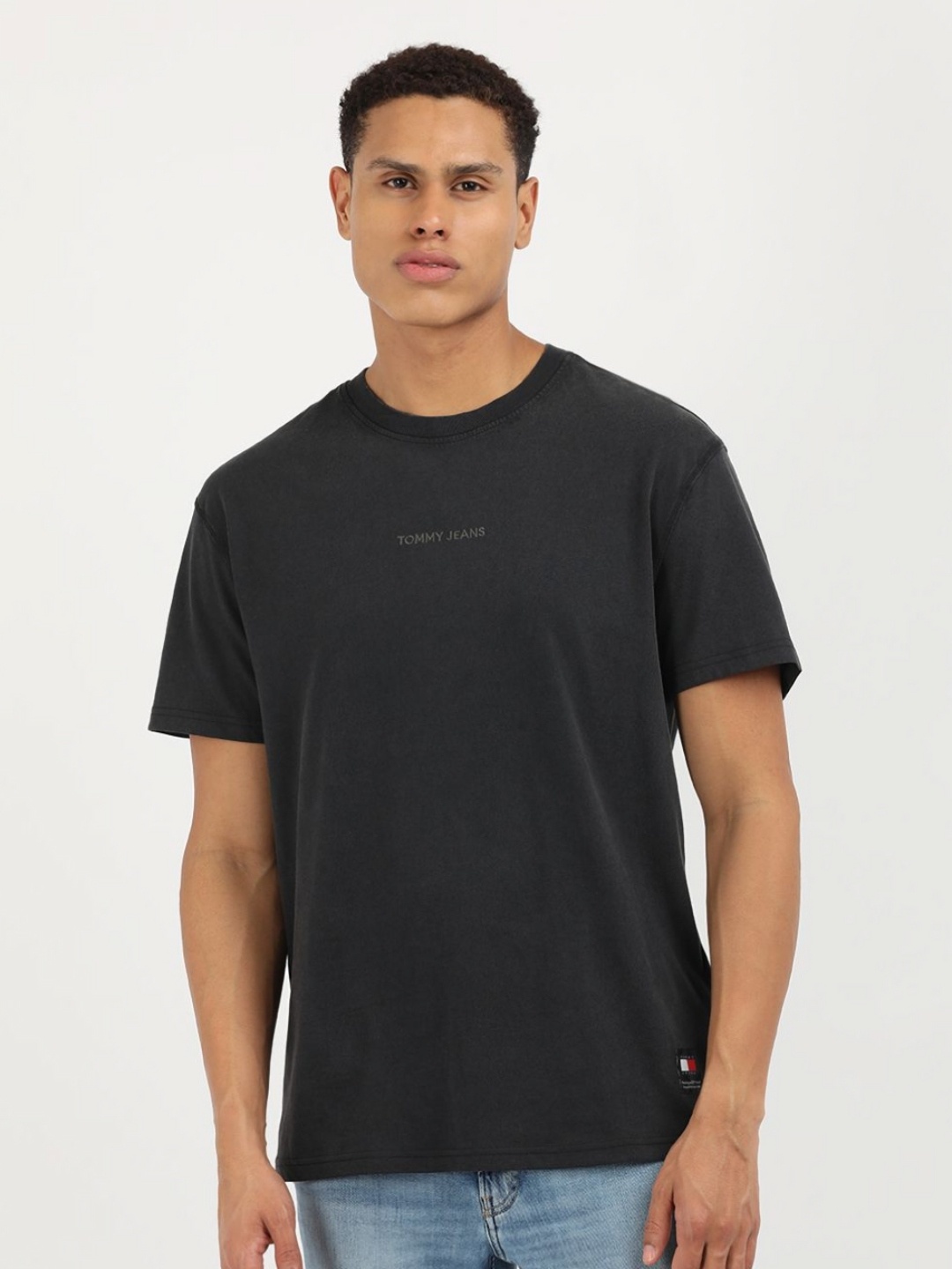 

Tommy Hilfiger Men Brand Logo Printed Round Neck Cotton T-shirt, Black