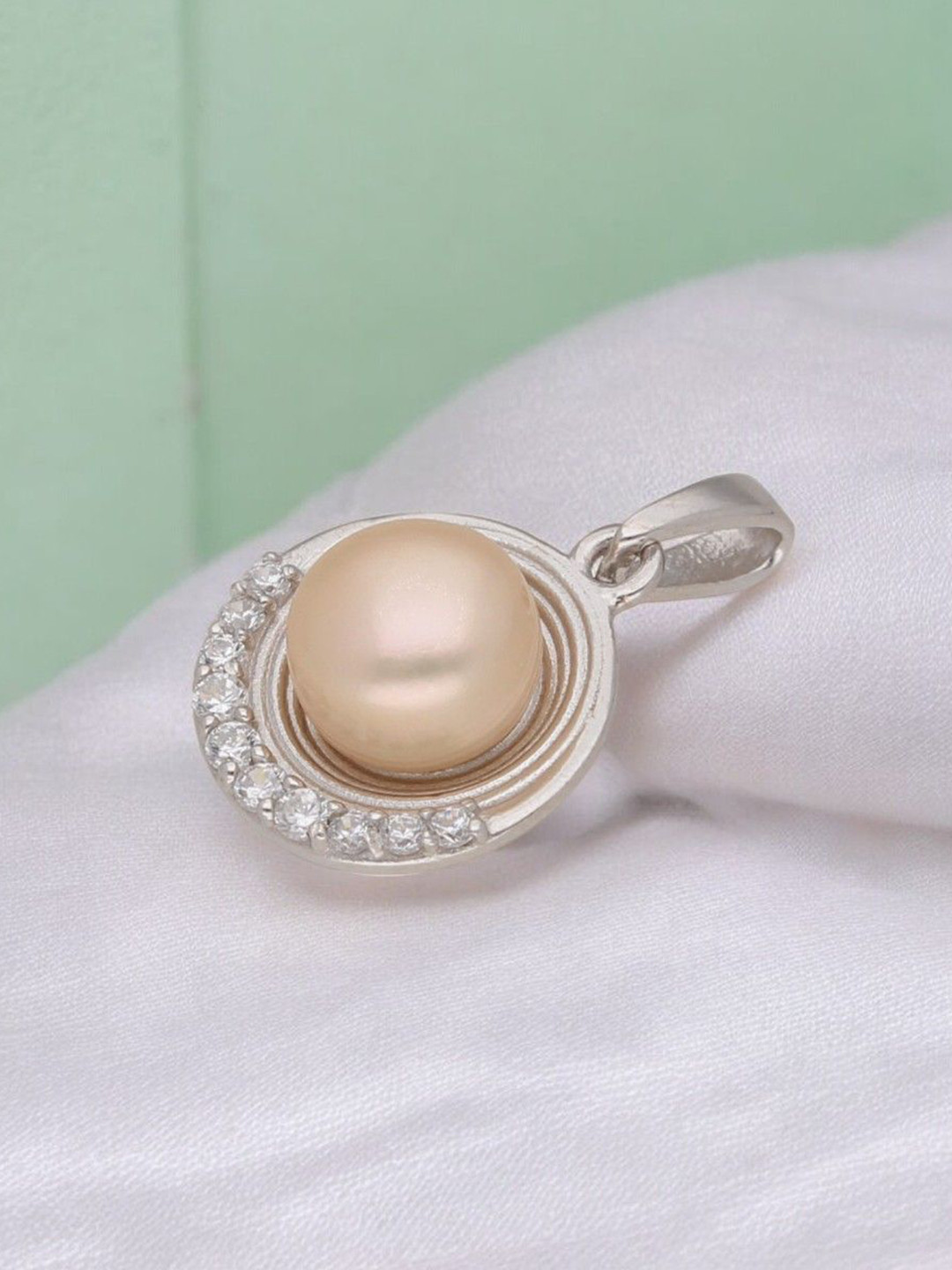 

Sri Jagdamba Pearls Dealer 92.5 Sterling Silver Circular Pendants