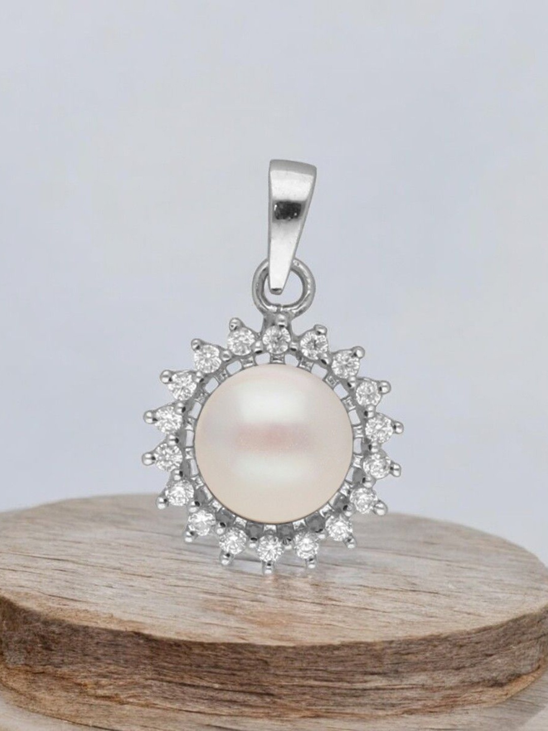 

Sri Jagdamba Pearls Dealer Silver Plated 92.5 Sterling Silver Circular Pendant