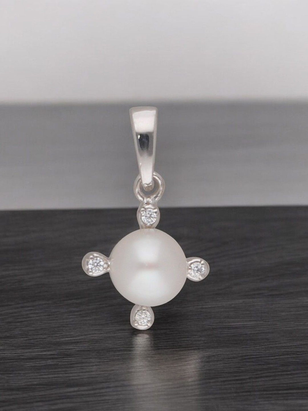 

Sri Jagdamba Pearls Dealer Silver Plated 92.5 Sterling Silver Circular Pendant