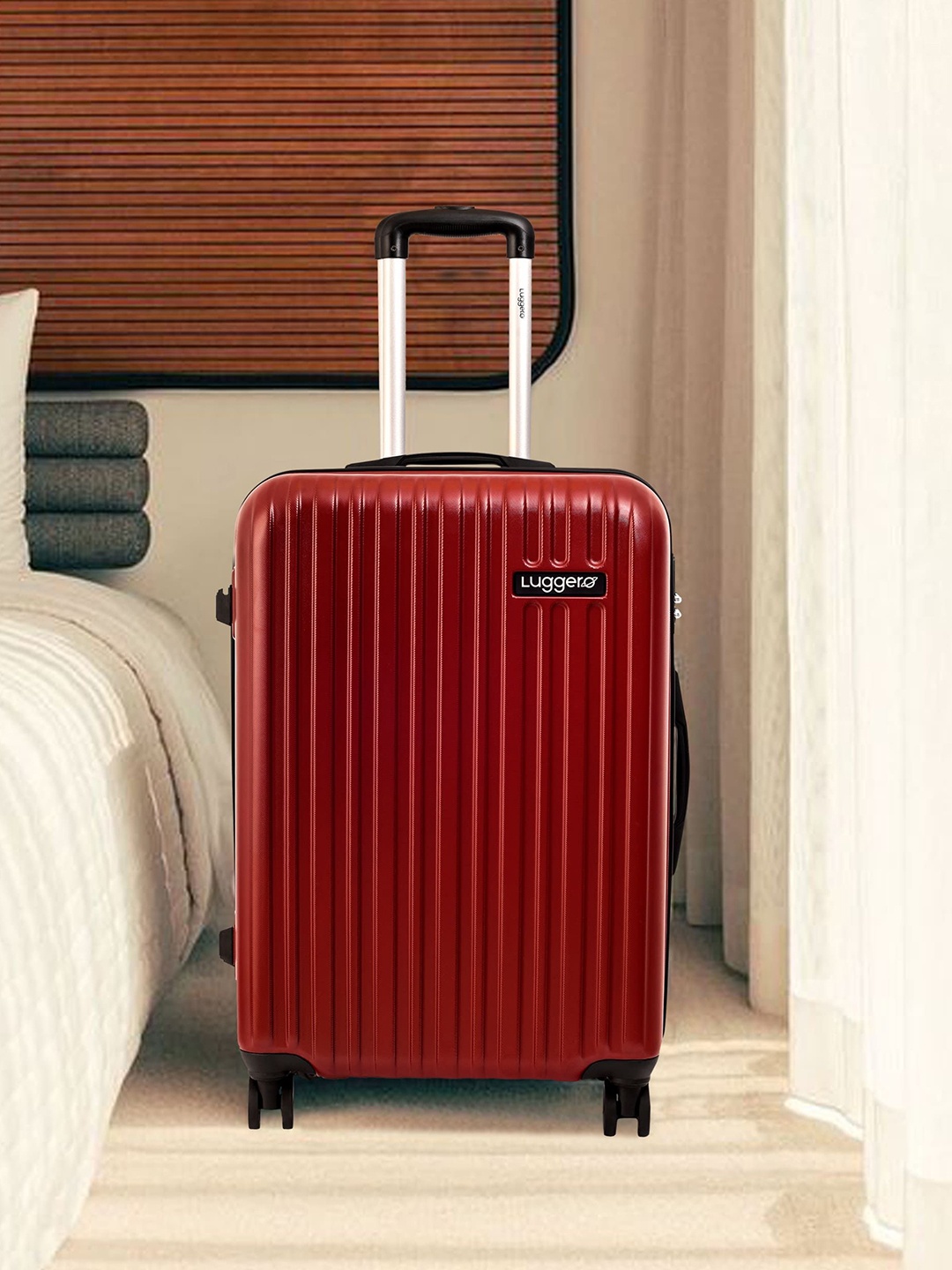 

Luggero 360-Degree Rotation Hard Sided Medium Trolley Bag, Red