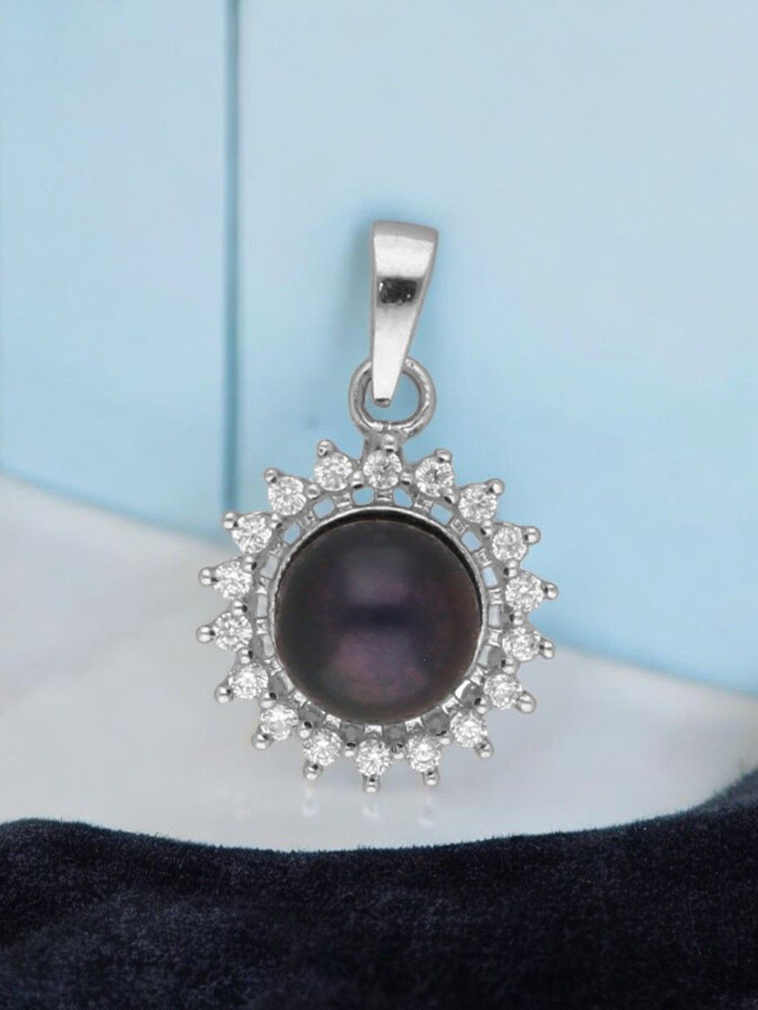 

Sri Jagdamba Pearls Dealer Silver Plated 92.5 Sterling Silver Circular Pendant
