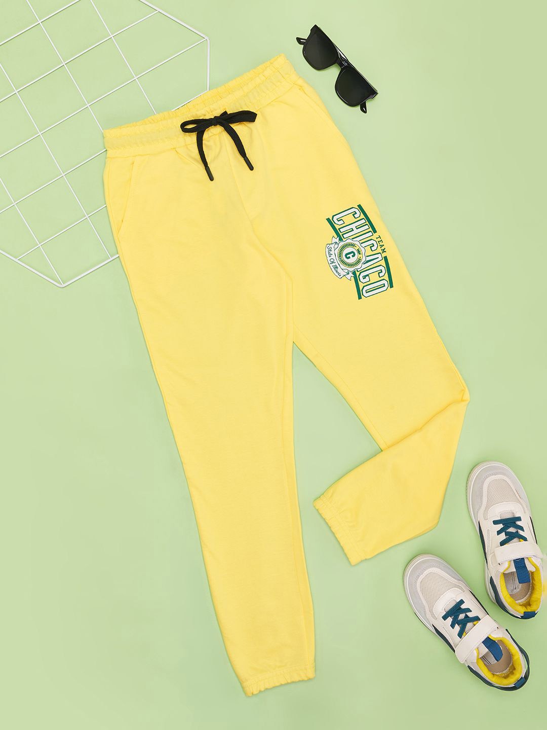 

Pantaloons Junior Boys Printed Pure Cotton Mid-Rise Track Pants, Yellow